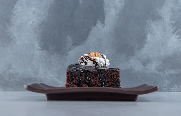 Brownie with Vanilla Frosting at Plate