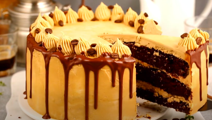 round chocolate espresso cake with a sliced portion removed